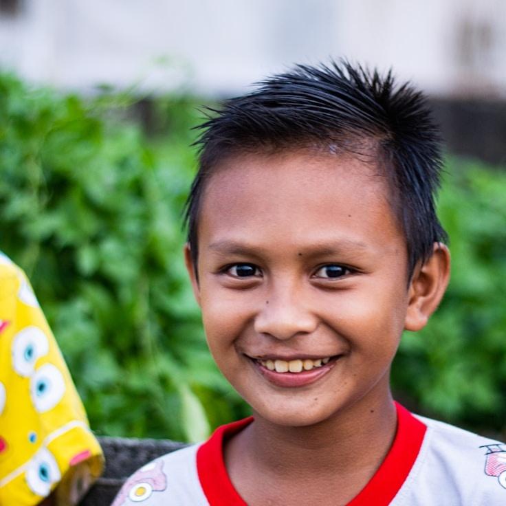 Ava Singh, Lead Design Curator at Mariner Journal Hub, reviewing corporate floral arrangements